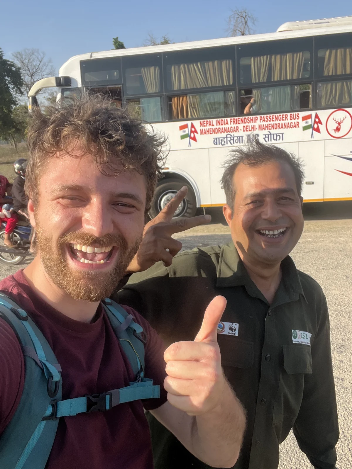 Robin with an official national park ranger and tracker