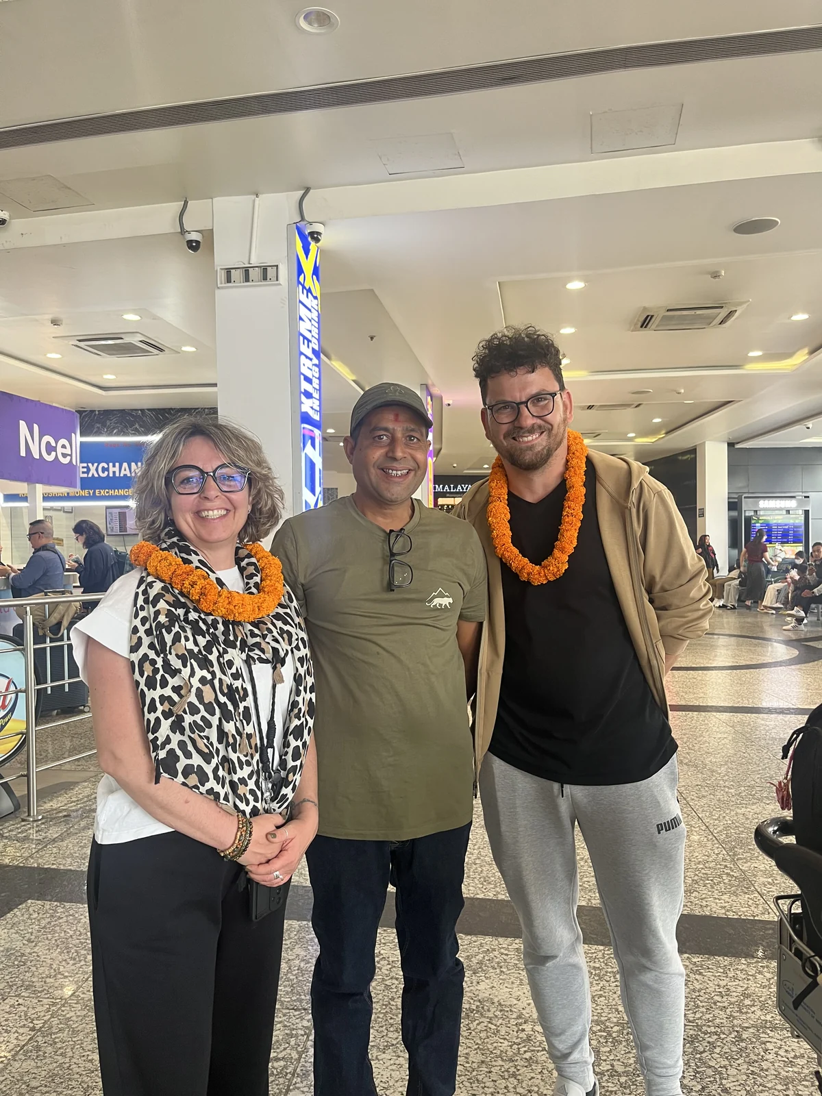Couple of travelers welcomed at the airport by our local team