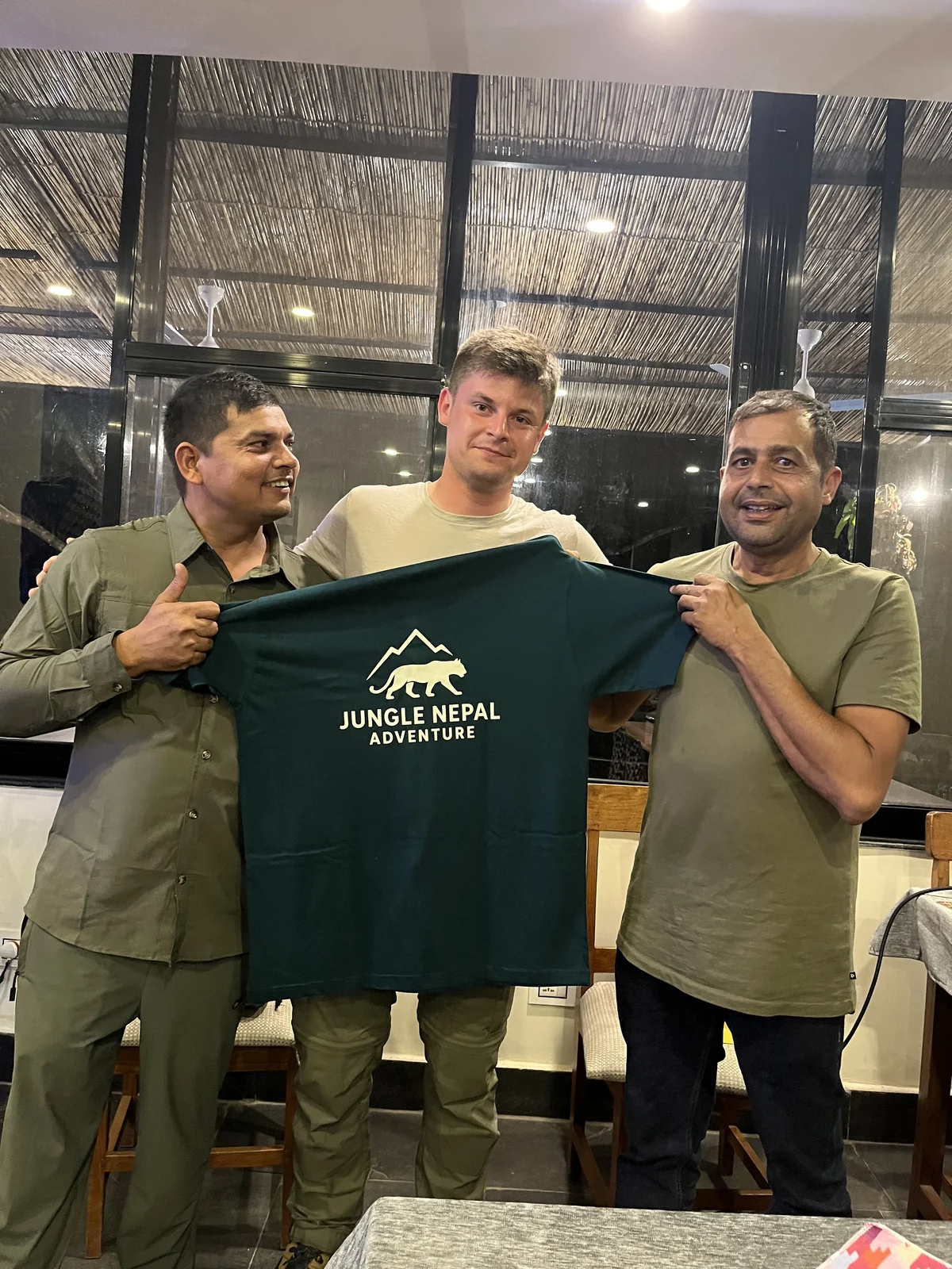 Proud traveler with the expedition t-shirt and master trackers